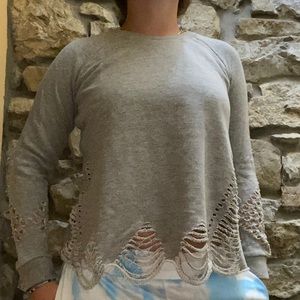 Distressed crew neck sweatshirt